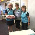 Murgon Golf Club Life Members, Leanne Dowdle and Carmel Smith presenting Jacqui Hohns with the Best Individual Score prize